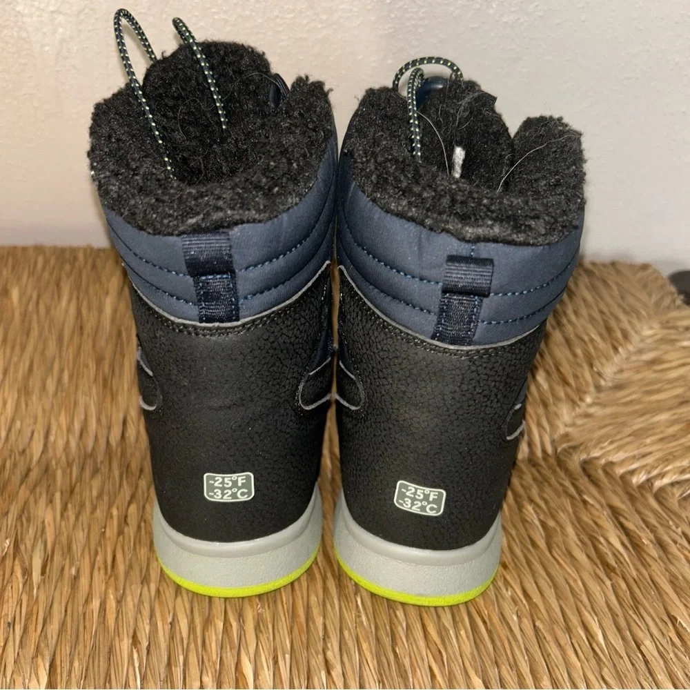 Merrell women’s ' Navy and Black Waterproof Winter Boots with Lime Accent
